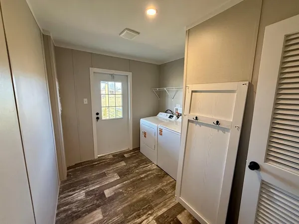 a utility room with dryer and washer