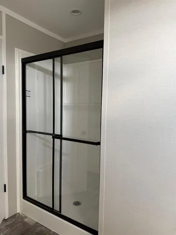 a close view of a closet with wooden floor