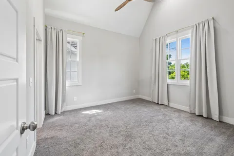 an empty room with windows