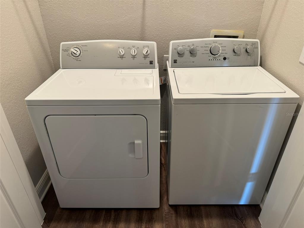 2460 Ann Rou Road, Unit 606 Tavares, FL 32778 - Photo 7 of 18 a utility room with dryer and washer