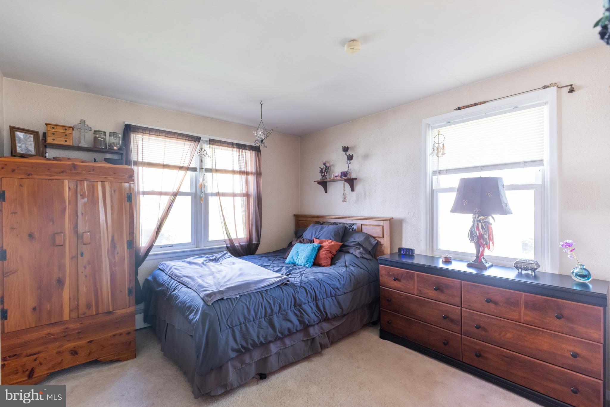 302 Spring Avenue Croydon, PA 19021 - Photo 12 of 24 The primary bedroom on the main floor