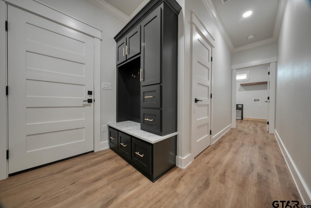 19383 Ridge Point Circle Lindale, TX 75771 - Photo 20 of 48 a view of hallway with wooden floor