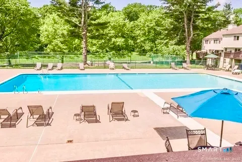 a view of a park with large trees