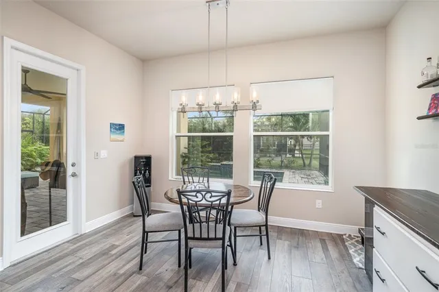 a kitchen with center island and stainless steel appliances