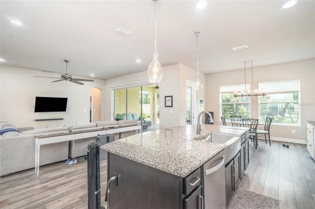 a spacious bedroom with a large bed and a window