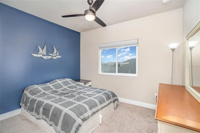 a view of walk in closet with chandelier