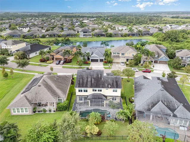 an aerial view of a house with a garden