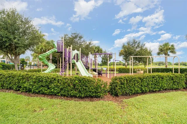 a view of an outdoor space and tennis court
