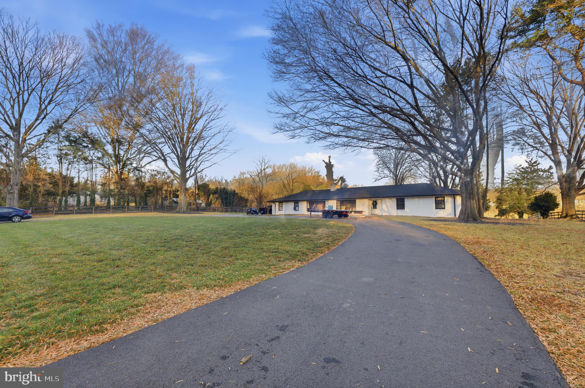 10622 Old Colchester Road Lorton, VA 22079 - Photo 11 of 23 a view of outdoor space with garden and trees
