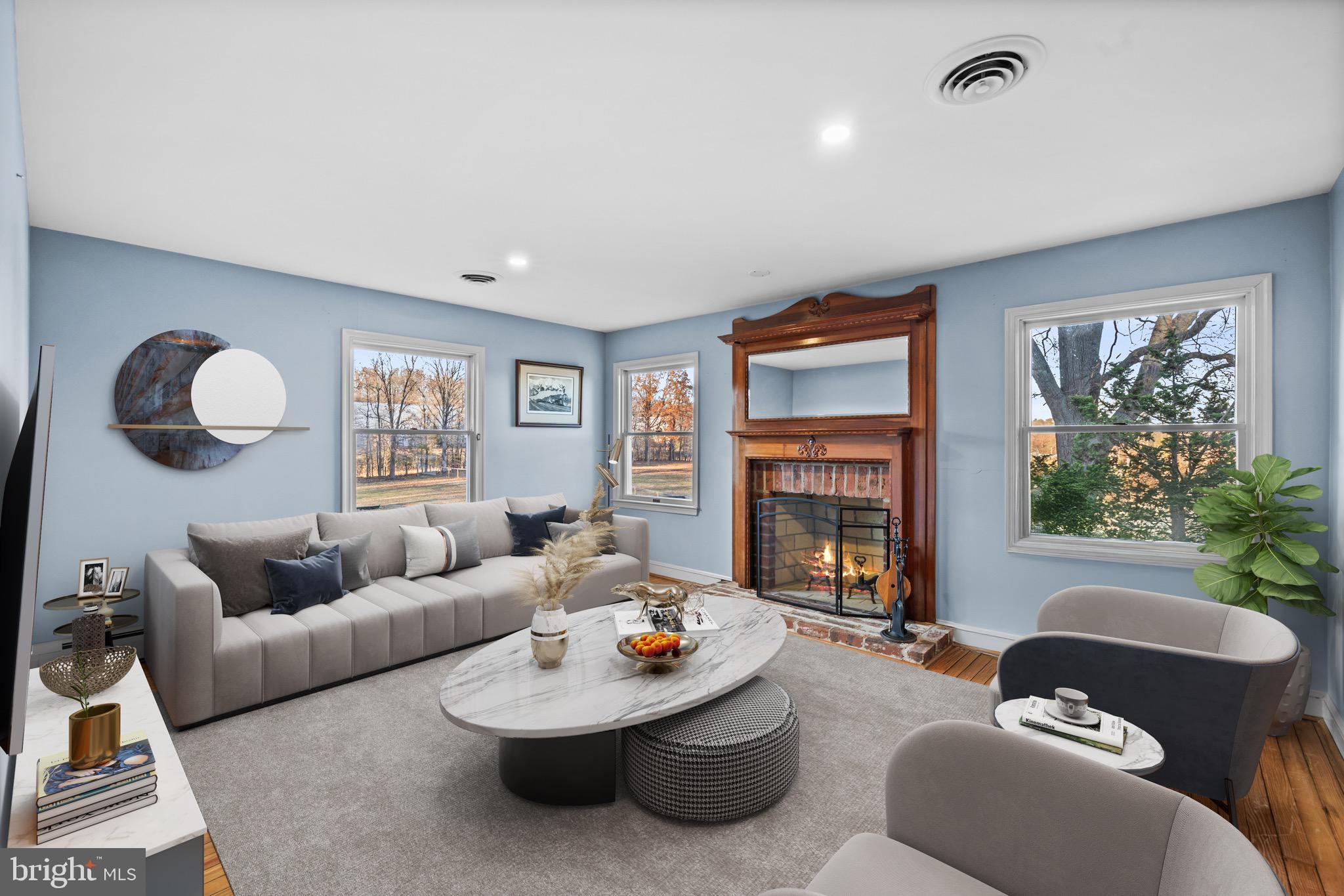 10622 Old Colchester Road Lorton, VA 22079 - Photo 18 of 23 a living room with furniture and a fireplace
