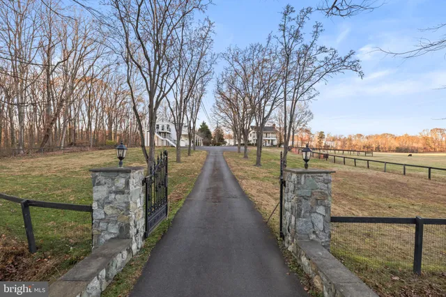 a backyard of a house with outdoor seating