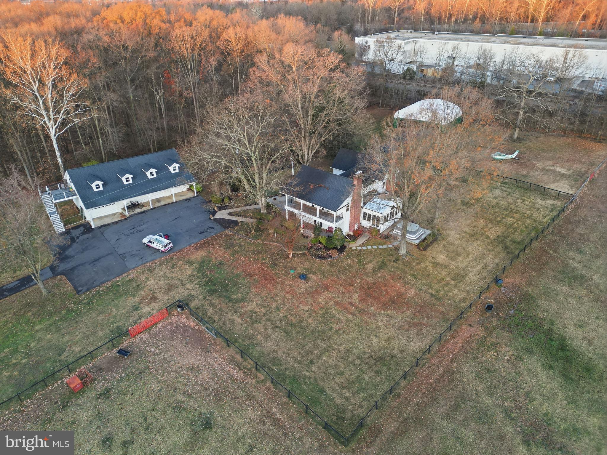 10622 Old Colchester Road Lorton, VA 22079 - Photo 3 of 23 a backyard of a house with outdoor seating