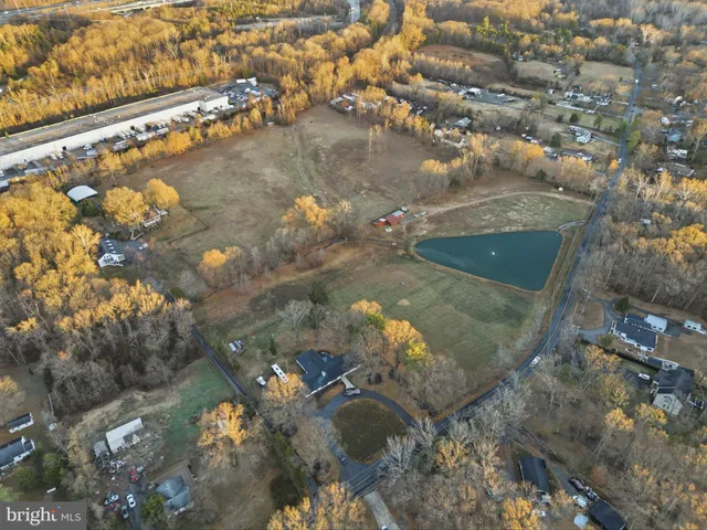 a view of a street with a building in the background
