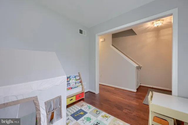 a area with lots of books on the wall