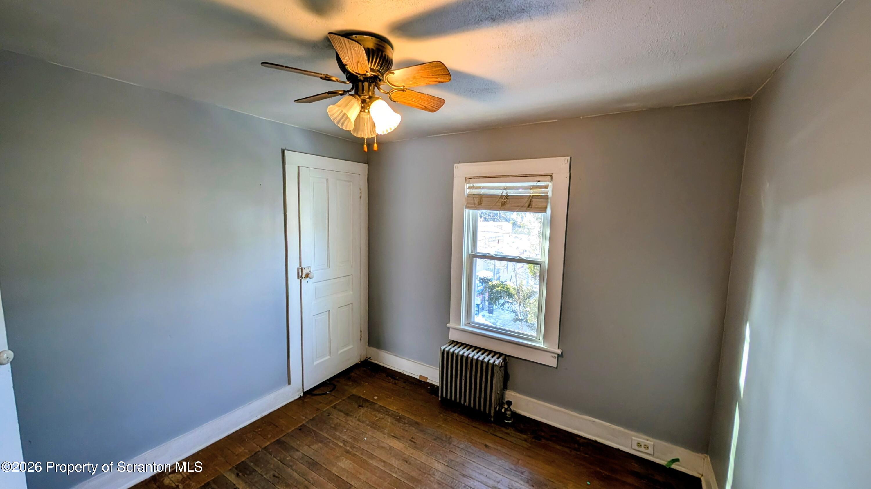 509 Main Street Duryea, PA 18642 - Photo 23 of 30 a view of an empty room with a window