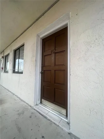 wooden floor and window in a room