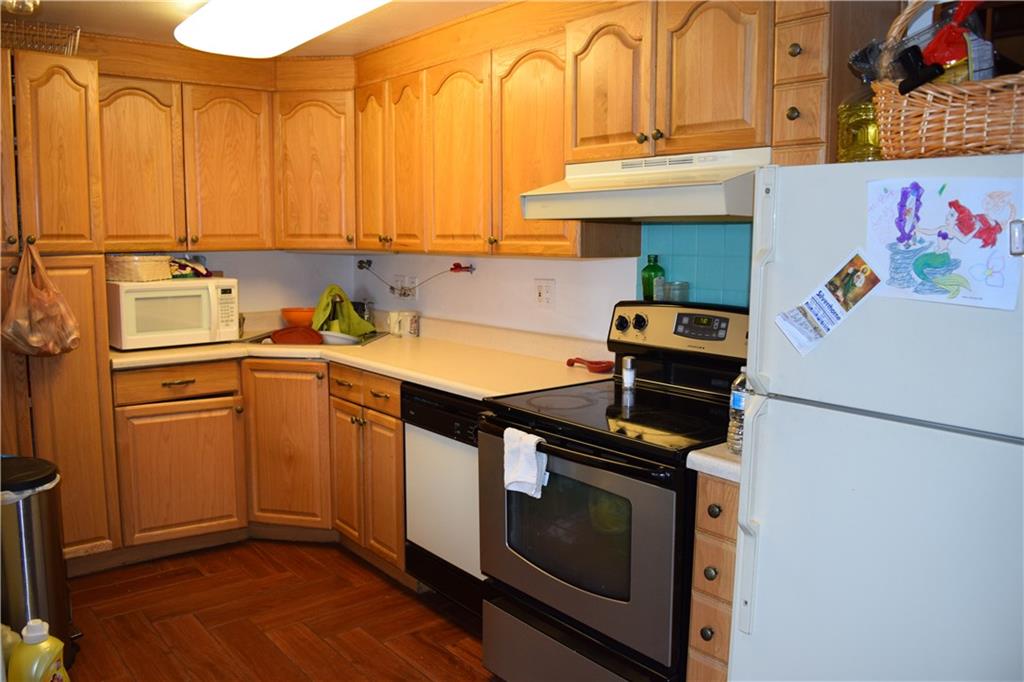70 Evergreen Road, Unit 103 Dillon, CO 80435 - Photo 1 of 8 a kitchen with stainless steel appliances a stove a sink and a refrigerator