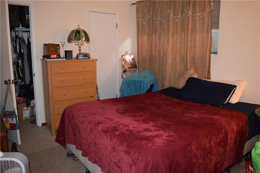 70 Evergreen Road, Unit 103 Dillon, CO 80435 - Photo 5 of 8 a bedroom with a bed and window