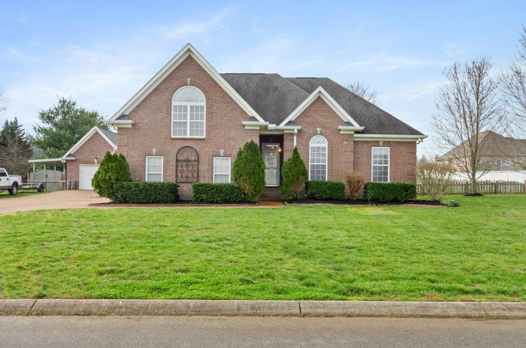 619 Lee Road Lebanon, TN 37087 - Photo 1 of 19 a front view of a house with a yard