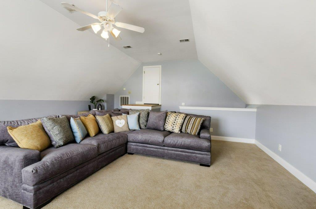 619 Lee Road Lebanon, TN 37087 - Photo 14 of 19 a living room with furniture a couch and a chandelier