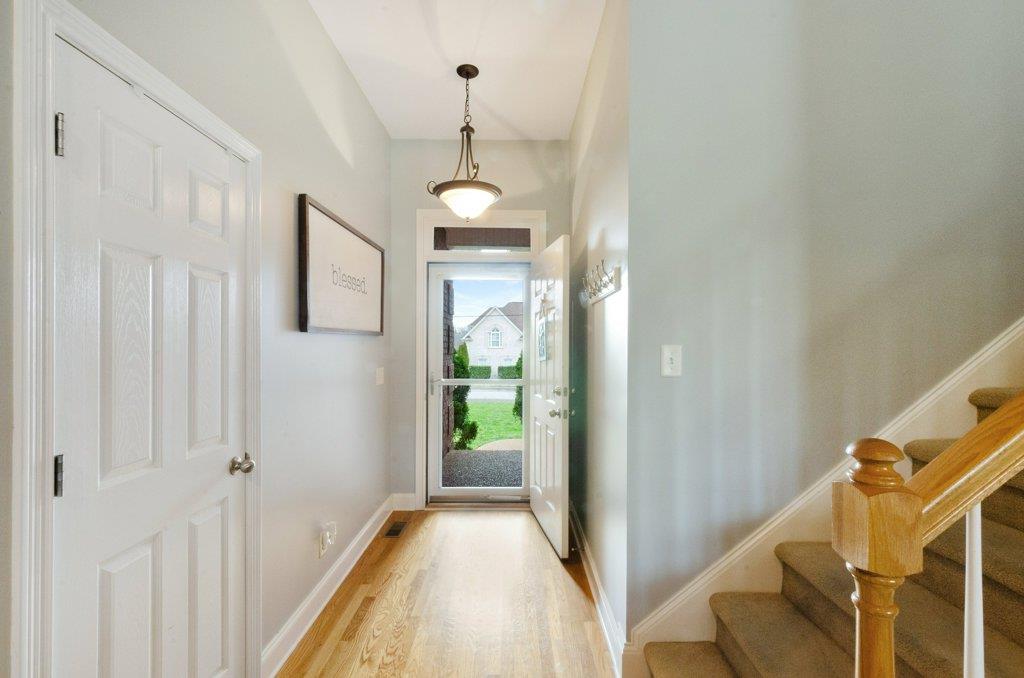 619 Lee Road Lebanon, TN 37087 - Photo 3 of 19 a view of hallway with livingroom and stairs