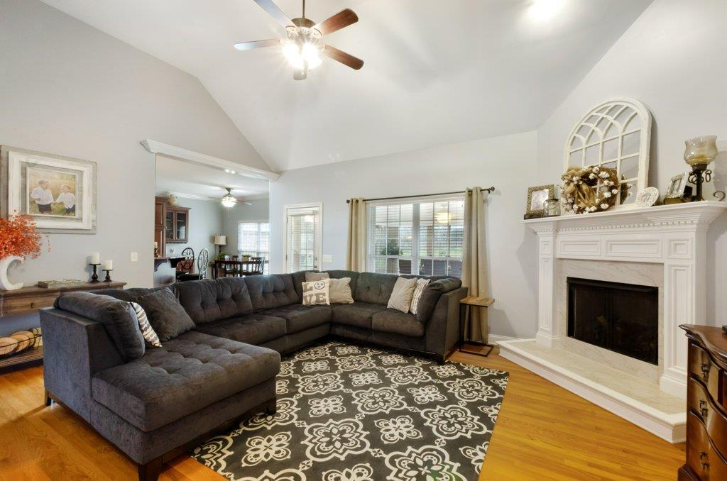 619 Lee Road Lebanon, TN 37087 - Photo 4 of 19 a living room with furniture and a fireplace