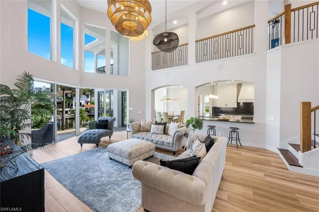 a living room with fireplace furniture and a flat screen tv