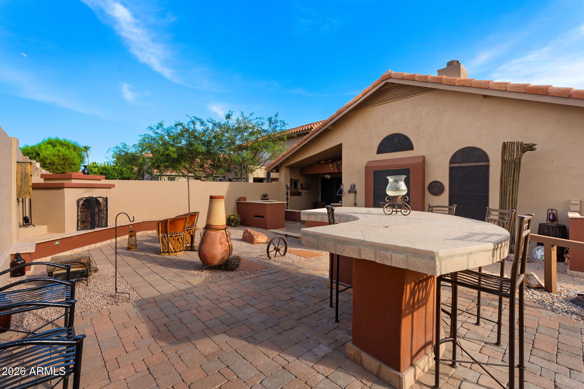 6526 East Raftriver Street Mesa, AZ 85215 - Photo 17 of 17 a view of house with patio outdoor seating