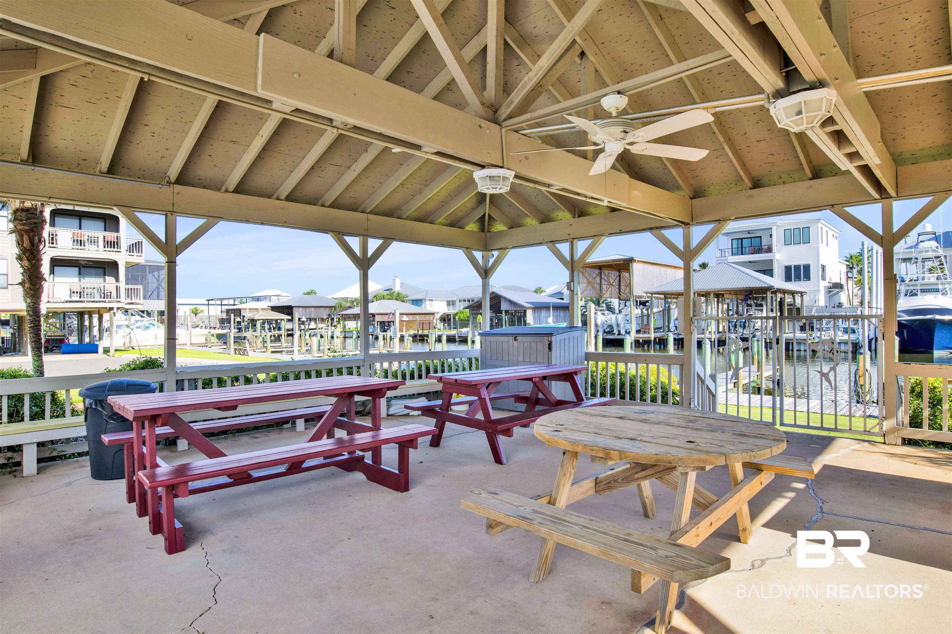 26913 Marina Road, Unit 213 Orange Beach, AL 36561 - Photo 26 of 30 View of patio featuring a gazebo, ceiling fan, and a water view