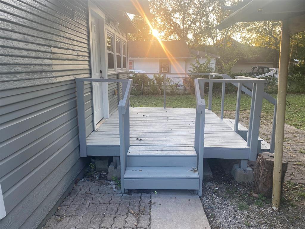 810 Greenville Road McKinney, TX 75069 - Photo 19 of 21 a view of a wooden deck with a bench
