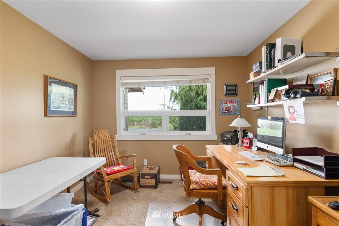 7351 Thiel Road Lynden, WA 98264 - Photo 20 of 33 a view of a workspace with furniture and a window