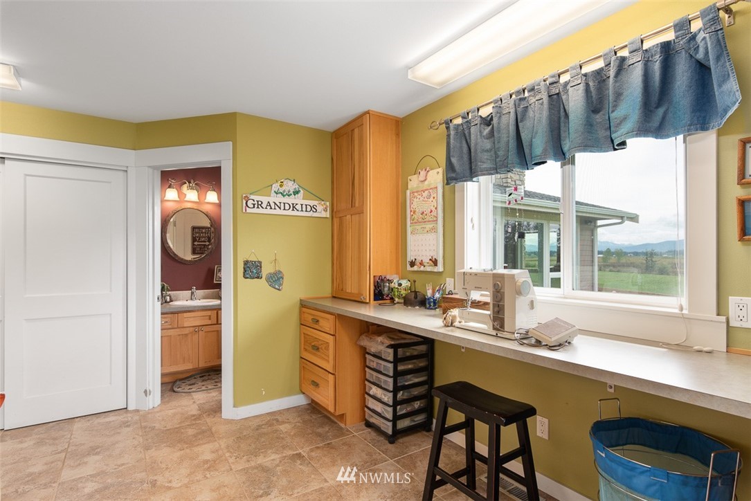 7351 Thiel Road Lynden, WA 98264 - Photo 21 of 33 a kitchen with a sink and a refrigerator