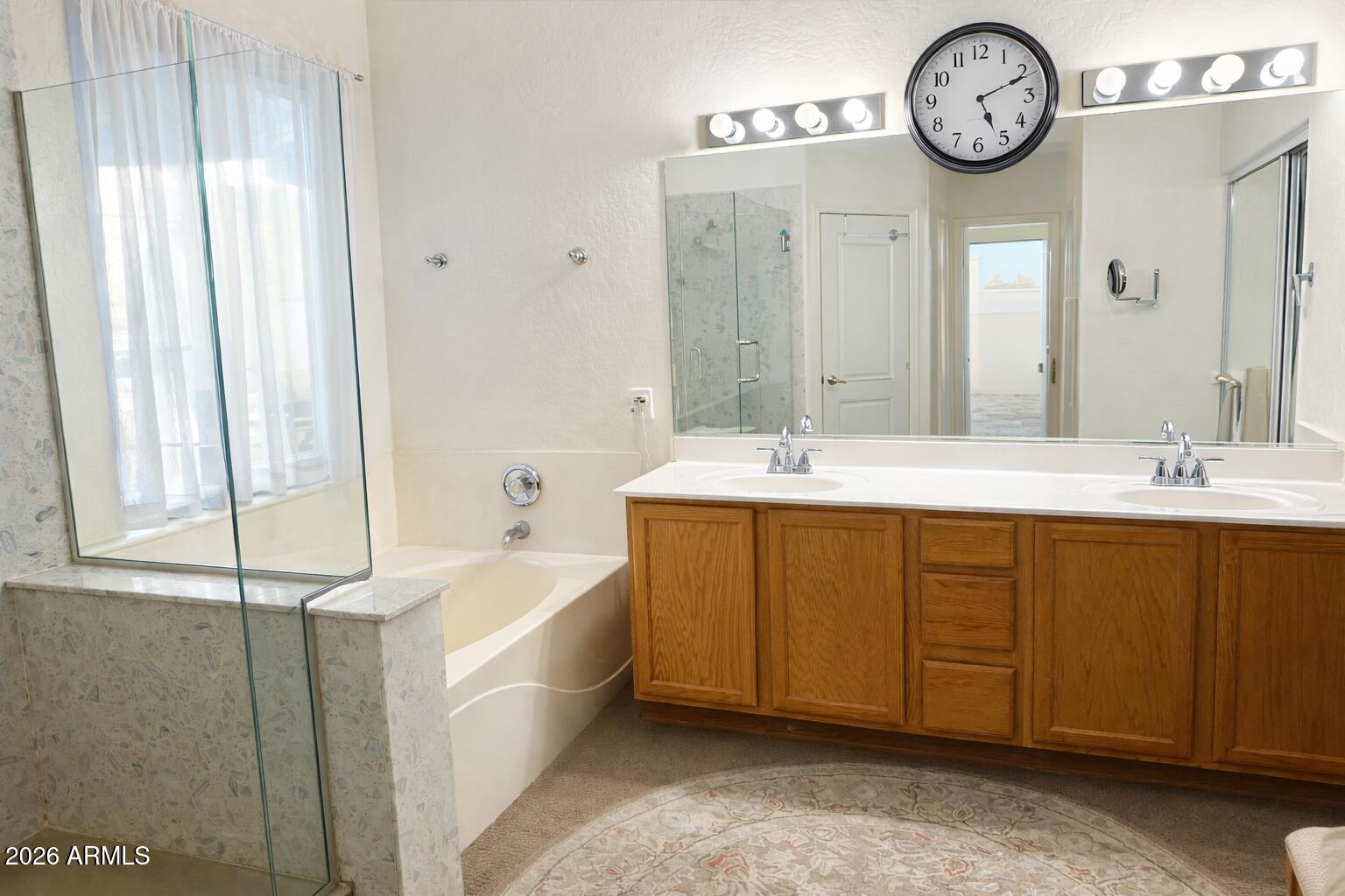 783 South Longmore Street Chandler, AZ 85224 - Photo 8 of 12 a spacious bathroom with a double vanity sink and a mirror