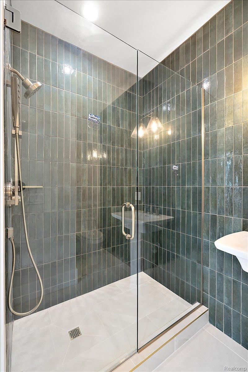 13459 Haddon Street Fenton, MI 48430 - Photo 24 of 84 Full bath with a shower stall and tile walls