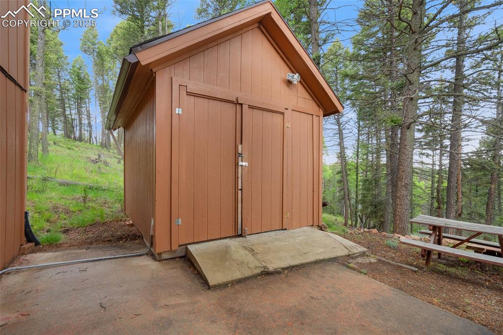 351 Porphry Road Florissant, CO 80816 - Photo 35 of 39 a backyard of a house with outdoor seating