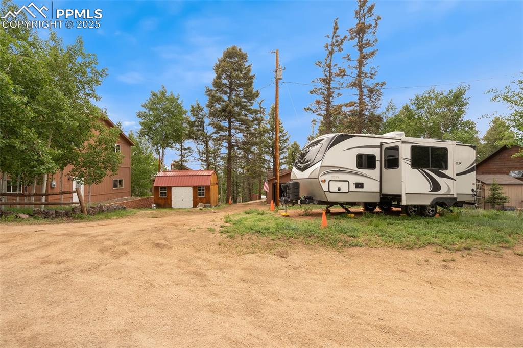 351 Porphry Road Florissant, CO 80816 - Photo 38 of 39 a house that has a tree in front of it