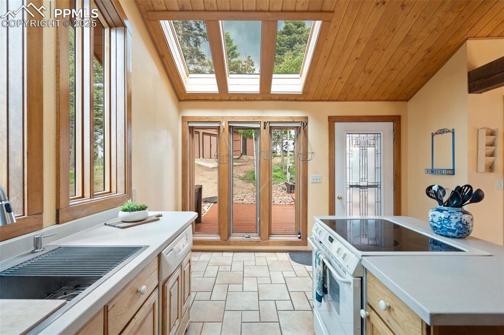351 Porphry Road Florissant, CO 80816 - Photo 4 of 39 a spacious bathroom with a granite countertop tub and a sink