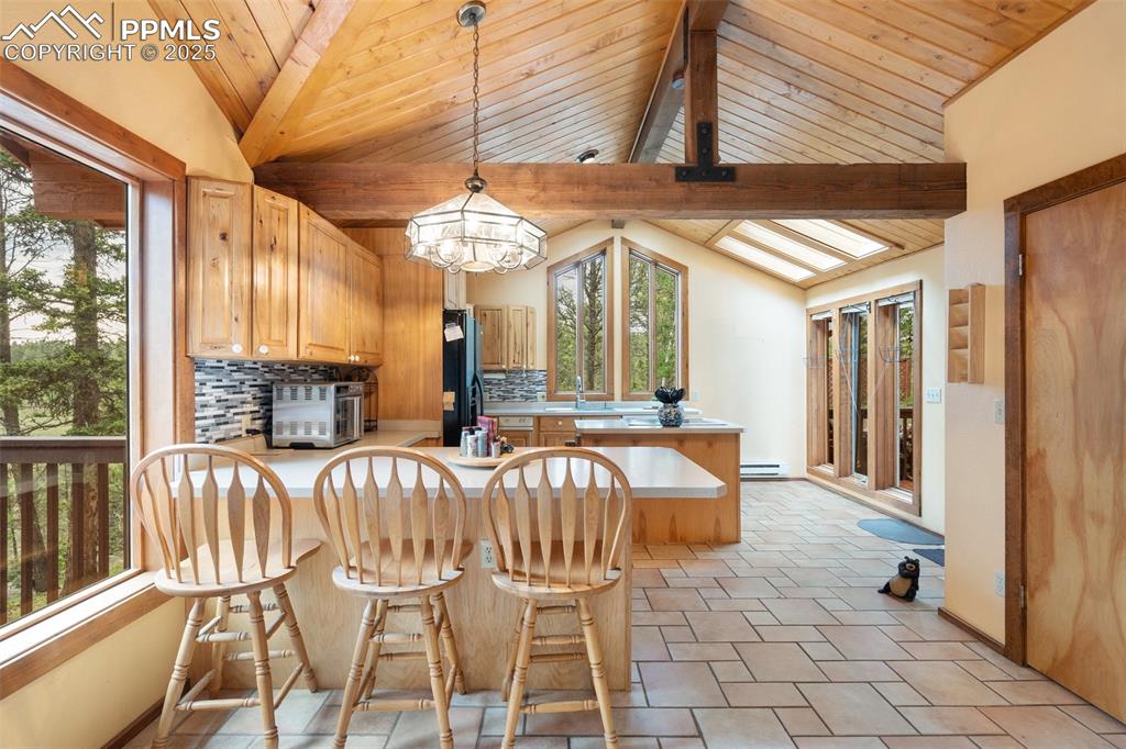 351 Porphry Road Florissant, CO 80816 - Photo 7 of 39 a view of a patio with a table and chairs