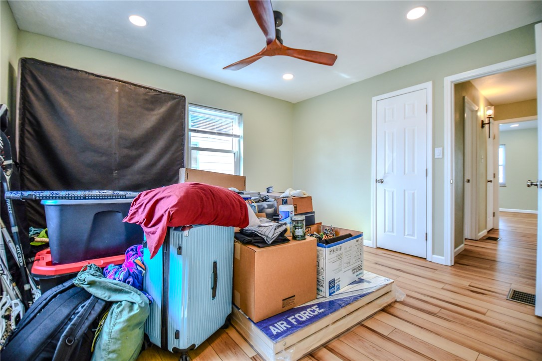 816 South Smithville Road Dayton, OH 45403 - Photo 20 of 33 Bright bedroom with wooden floors offers potential for comfortable living.