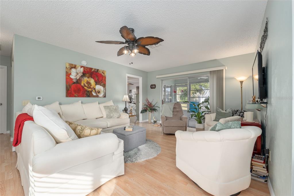 21373 Southwest Raintree Street Dunnellon, FL 34431 - Photo 17 of 39 a living room with furniture and a large window