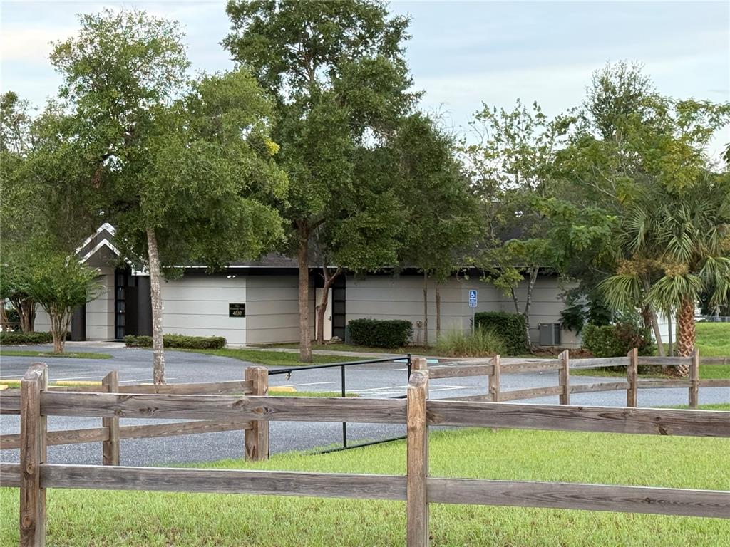 21373 Southwest Raintree Street Dunnellon, FL 34431 - Photo 38 of 39 a front view of a house with garden