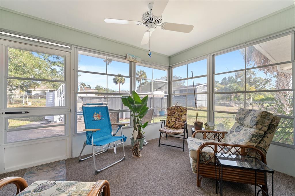21373 Southwest Raintree Street Dunnellon, FL 34431 - Photo 5 of 39 a living room with furniture and a window