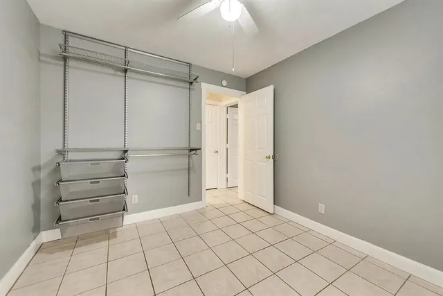 a view of an empty walk in closet