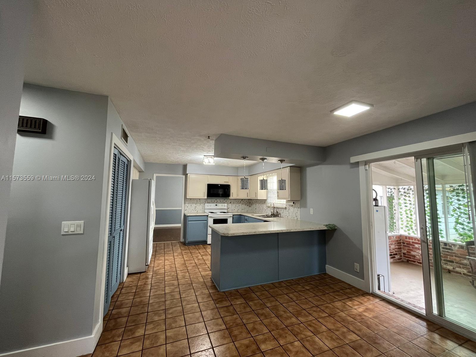 Confederate Point Jacksonville, FL 32210 - Photo 17 of 60 a kitchen with stainless steel appliances granite countertop a refrigerator and a sink