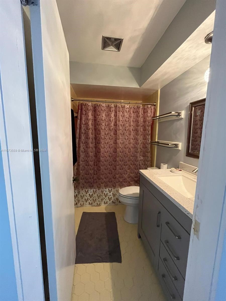 Confederate Point Jacksonville, FL 32210 - Photo 25 of 60 a bathroom with a sink a toilet and shower