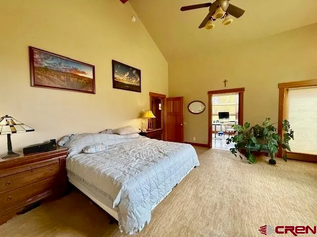 a spacious bathroom with a double vanity sink and mirror