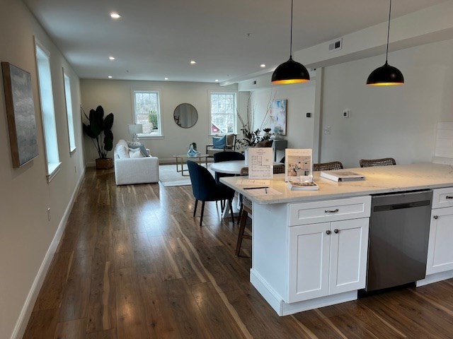 1 Pleasant Street, Unit 202 Cohasset, MA 02025 - Photo 11 of 20 a very nice looking room with a large window