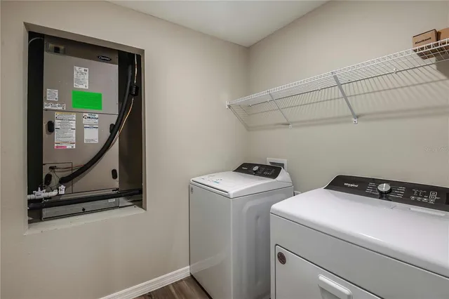 a utility room with dryer and washer
