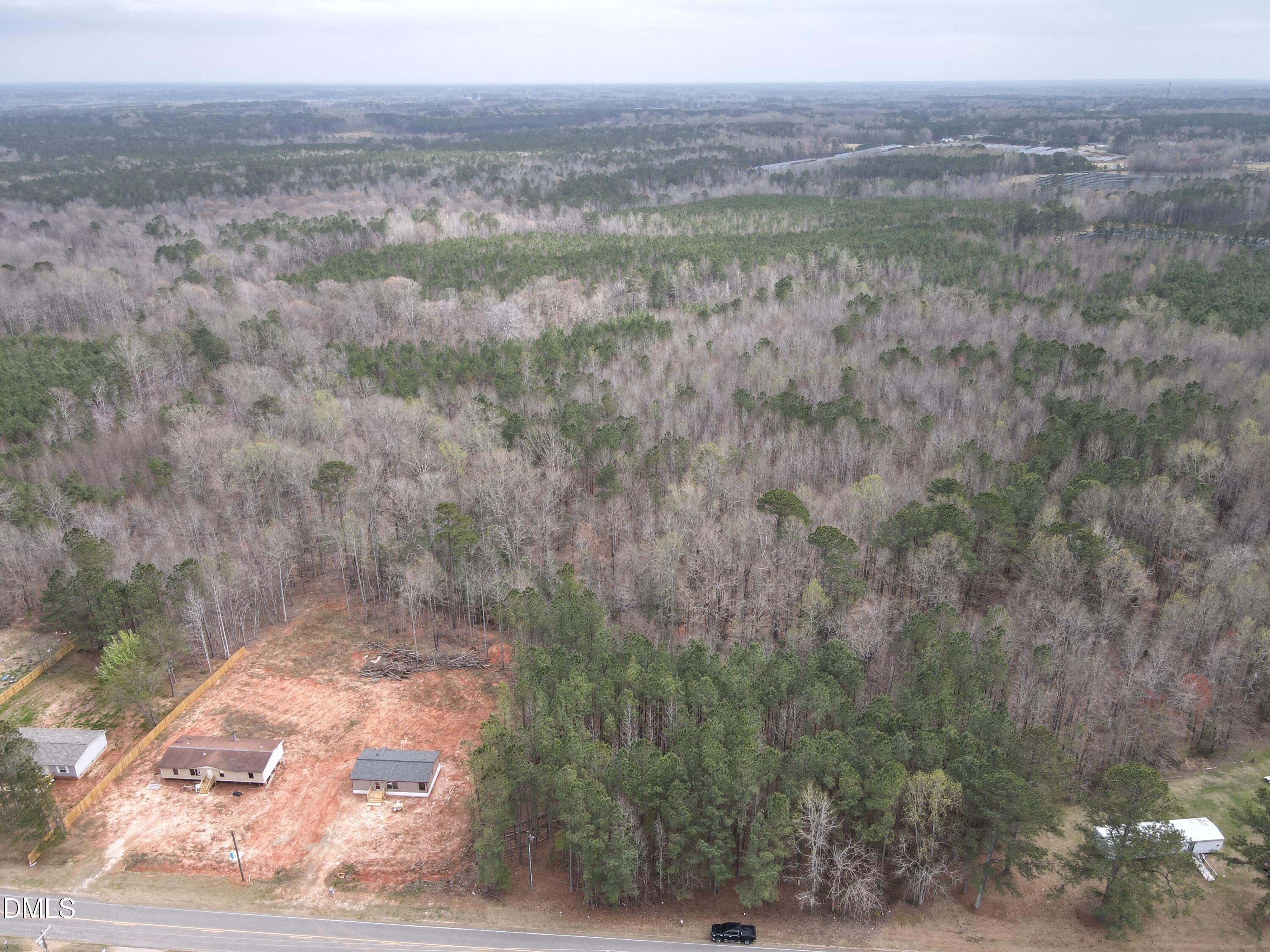 0 Old US Highway 64 Spring Hope, NC 27882 - Photo 4 of 4 a view of a yard with an trees