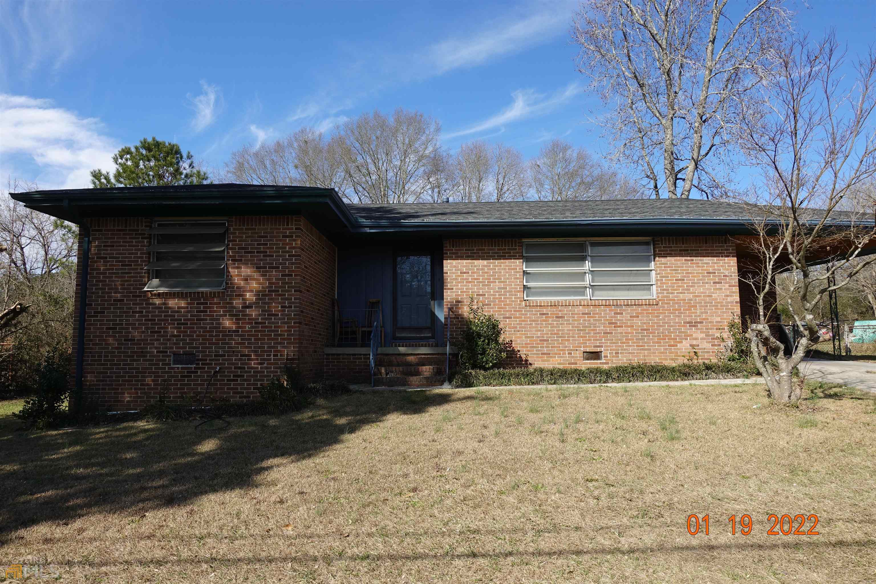 1526 Conley Road Conley, GA 30288 - Photo 1 of 1 a front view of a house with a yard